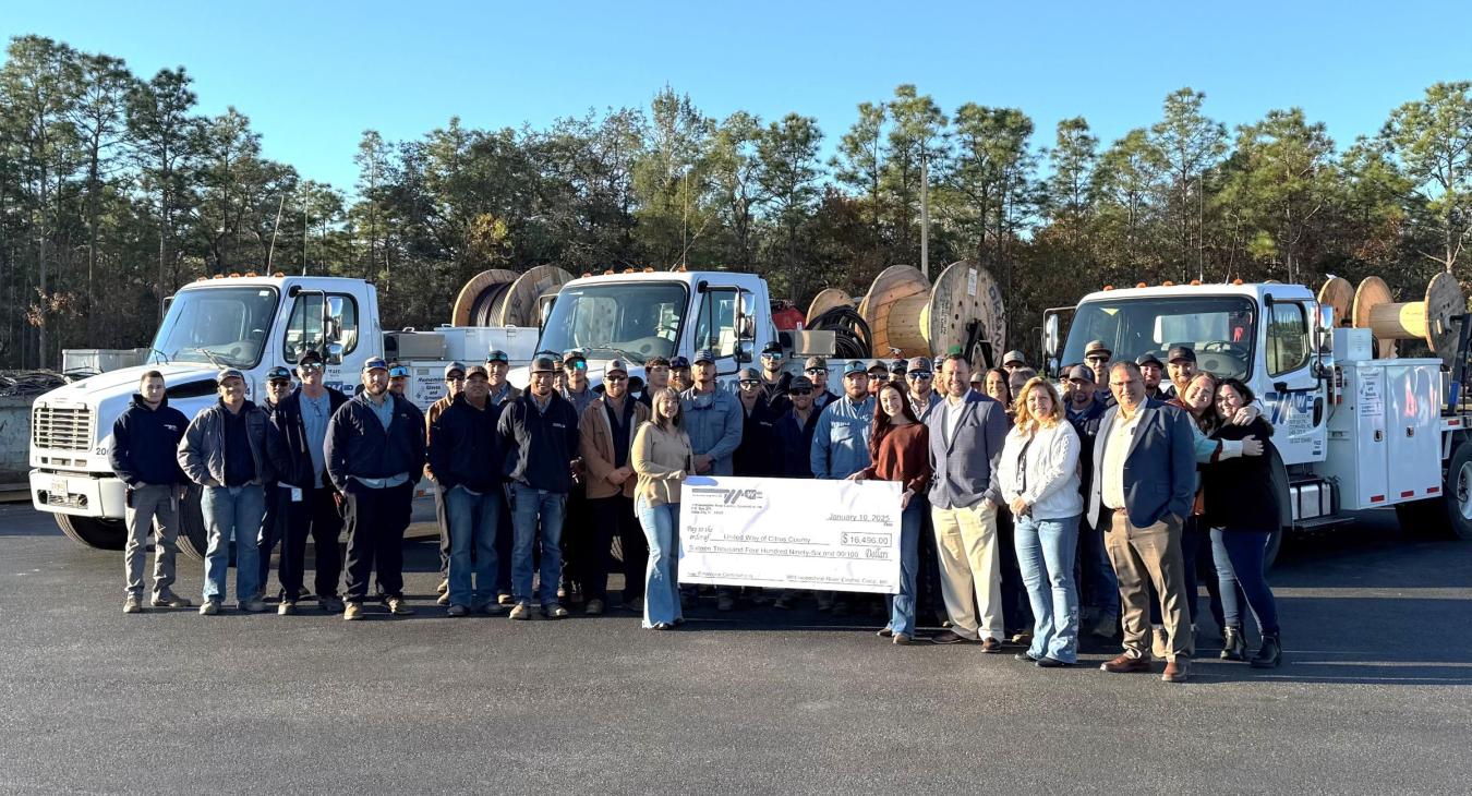 WREC presents United Way of Citrus County with a $16,496.00 donation check