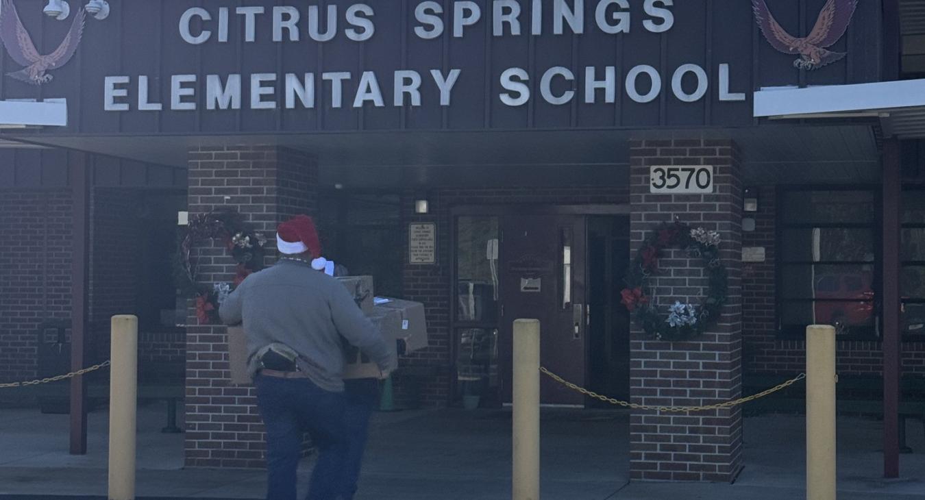 WREC Delivers Angel Tree Gifts to Citrus Springs Elementary