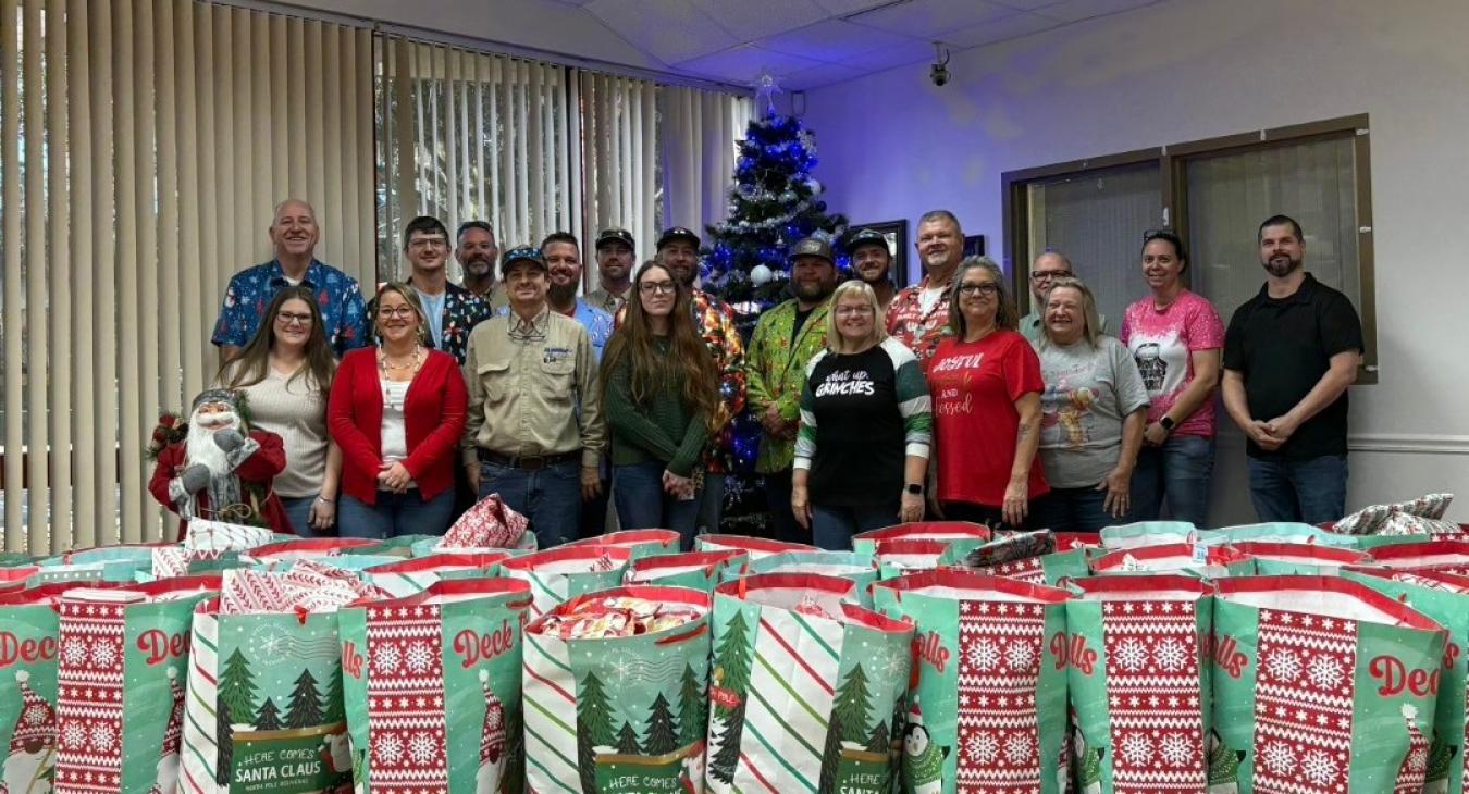 WREC Delivers Angel Tree Gifts to Fox Hollow Elementary School