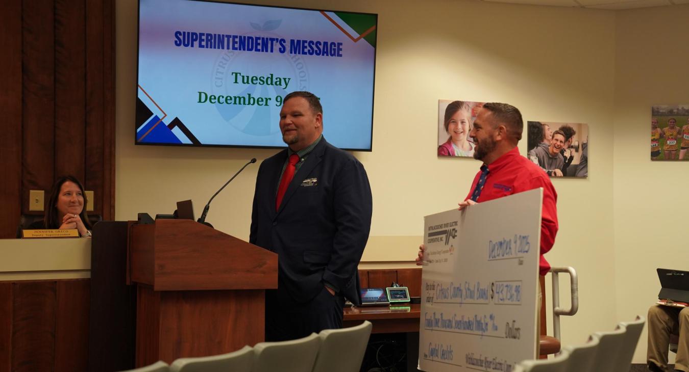 WREC Presents Citrus County School Board their Capital Credits check for $43,736.98