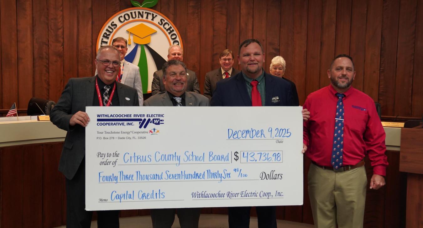 WREC Presents Citrus County School Board their Capital Credits check for $43,736.98