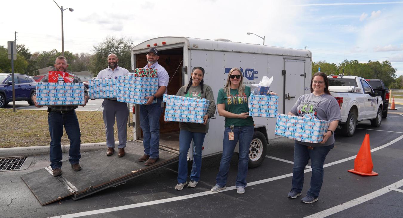 WREC Delivers Angel Tree Gifts to Quail Hollow Elementary School