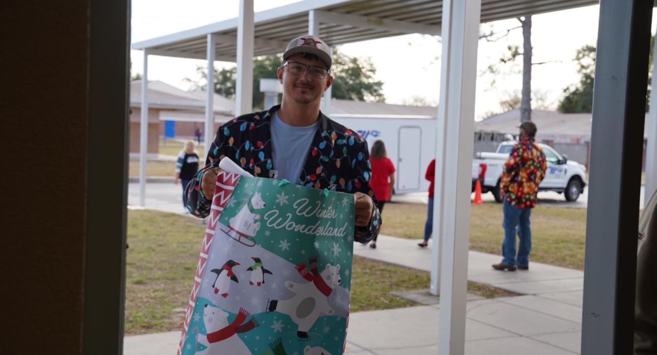 WREC Delivers Angel Tree Gifts to Fox Hollow Elementary School