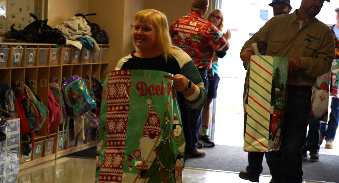 WREC Delivers Angel Tree Gifts to Fox Hollow Elementary School