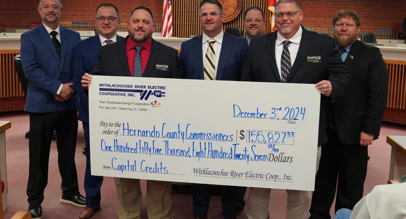 WREC Presents Hernando County Commissioners their Capital Credits check for $155,827.33