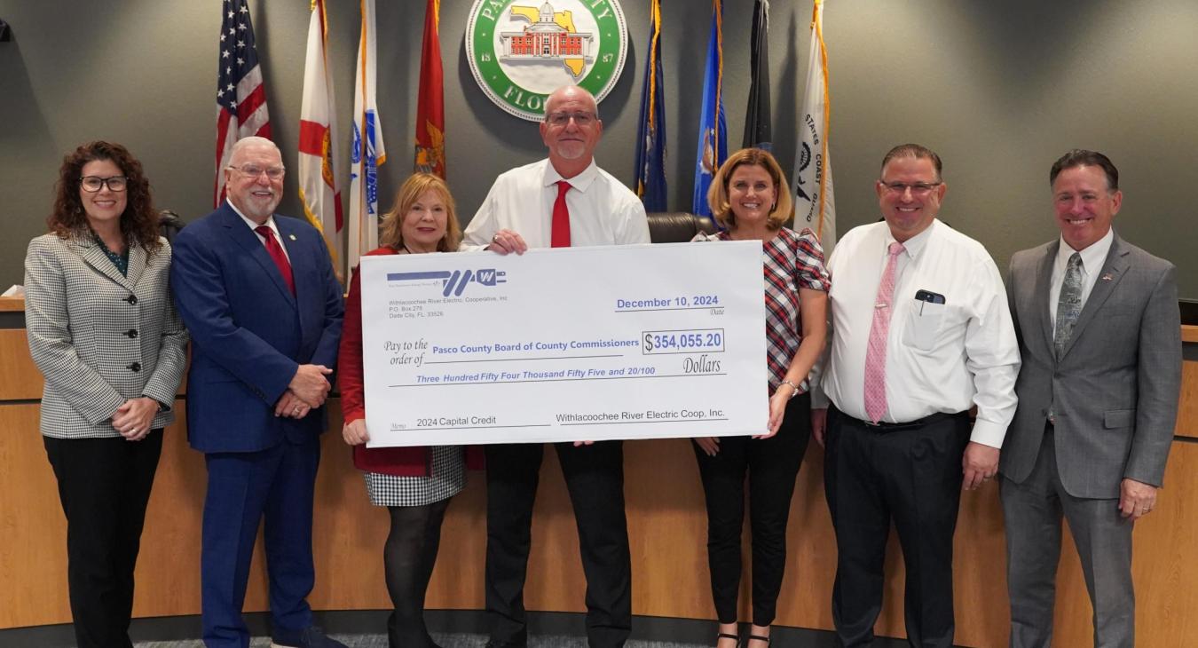 WREC Presents Pasco County Commissioners their Capital Credits check for $354,055.20