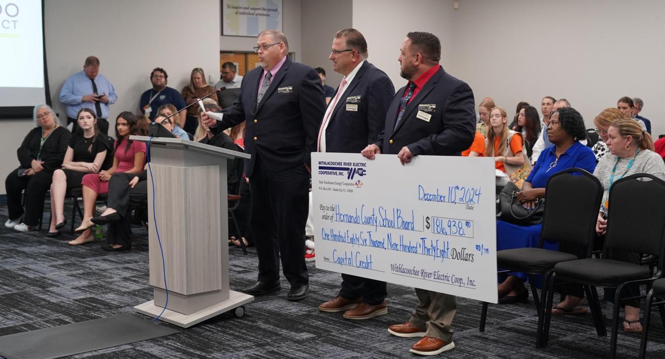 WREC Presents Hernando County School Board their Capital Credits check for $186,938.90