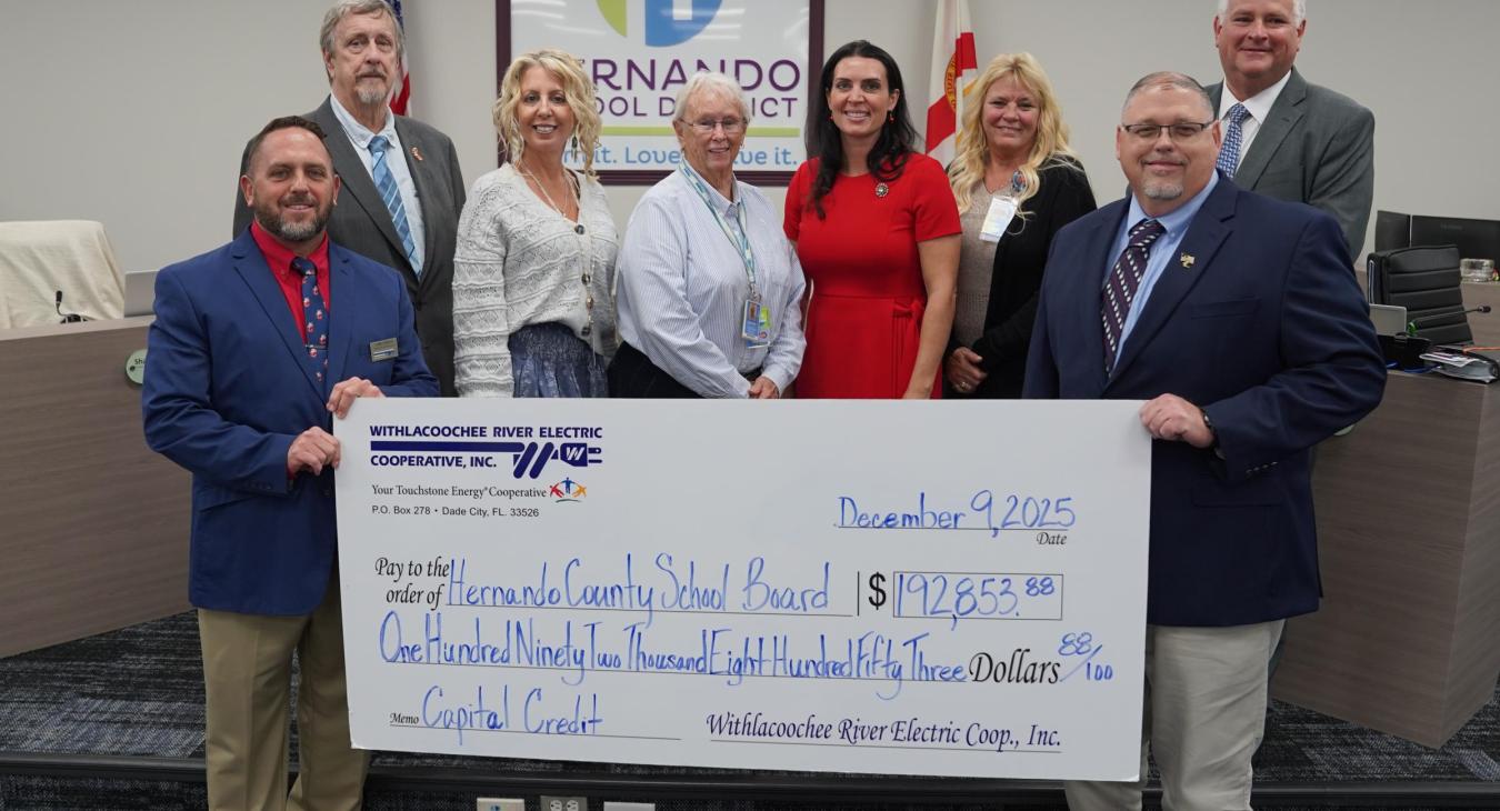 WREC Presents Hernando County School Board their Capital Credits check for $192,853.88