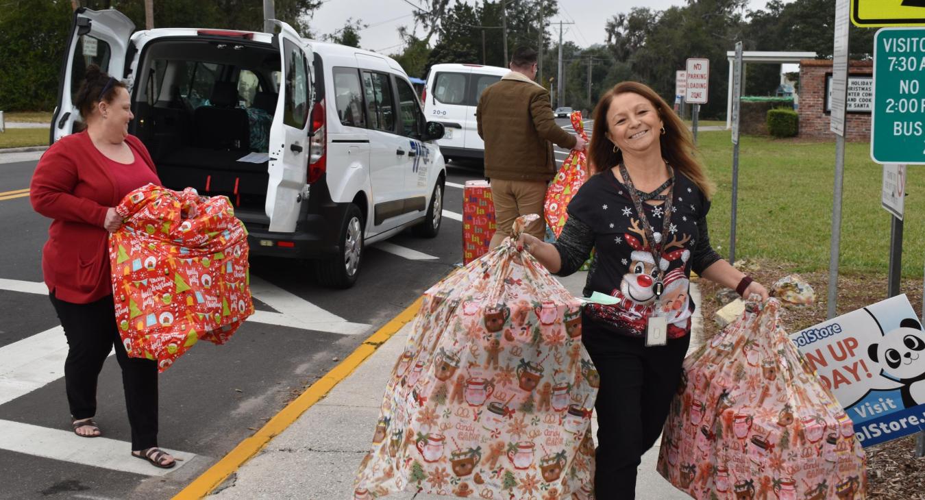 WREC Delivers Angel Tree Gifts to Cox Elementary School