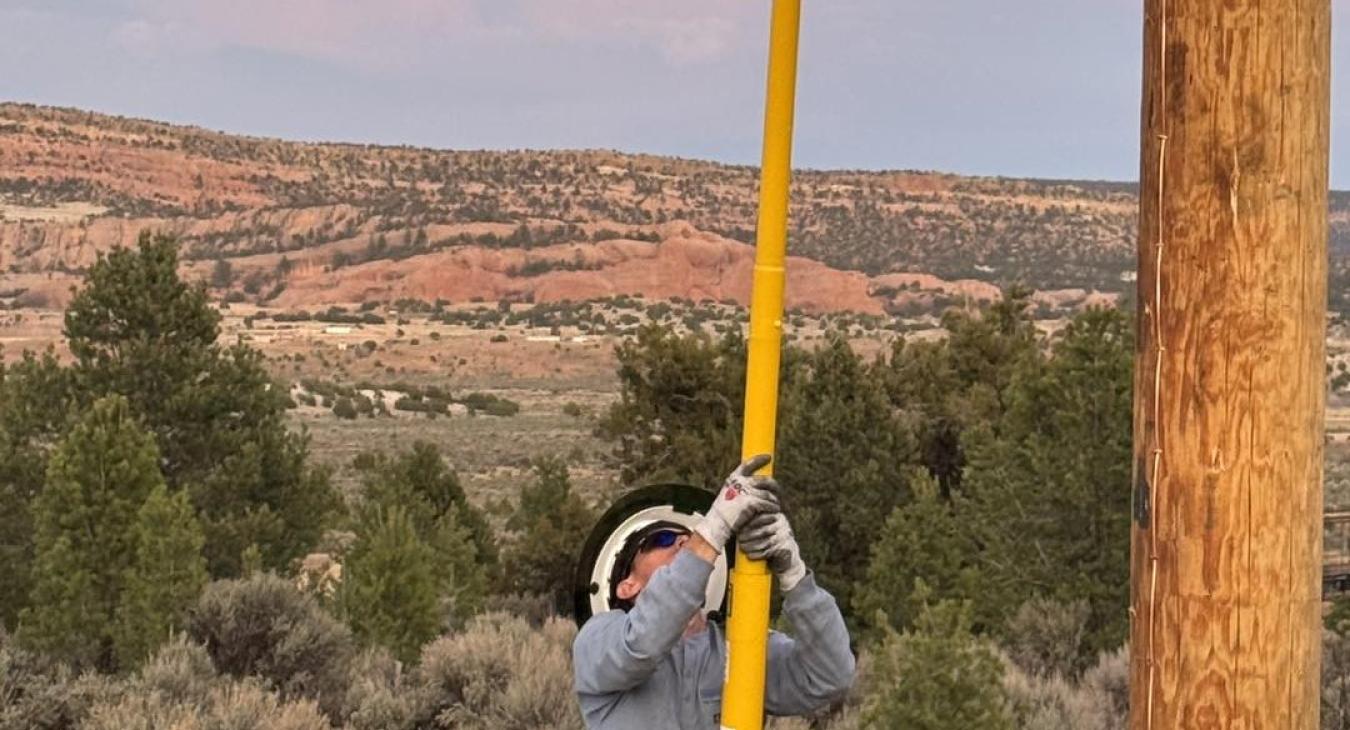 Two Navajo Families Receive Power on WREC's First Day of Light Up Navajo Project