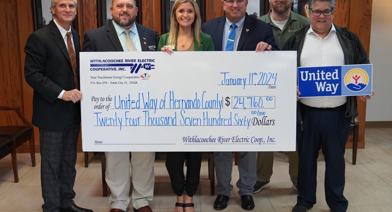 WREC presents United Way of Hernando County with a $24,760 donation check