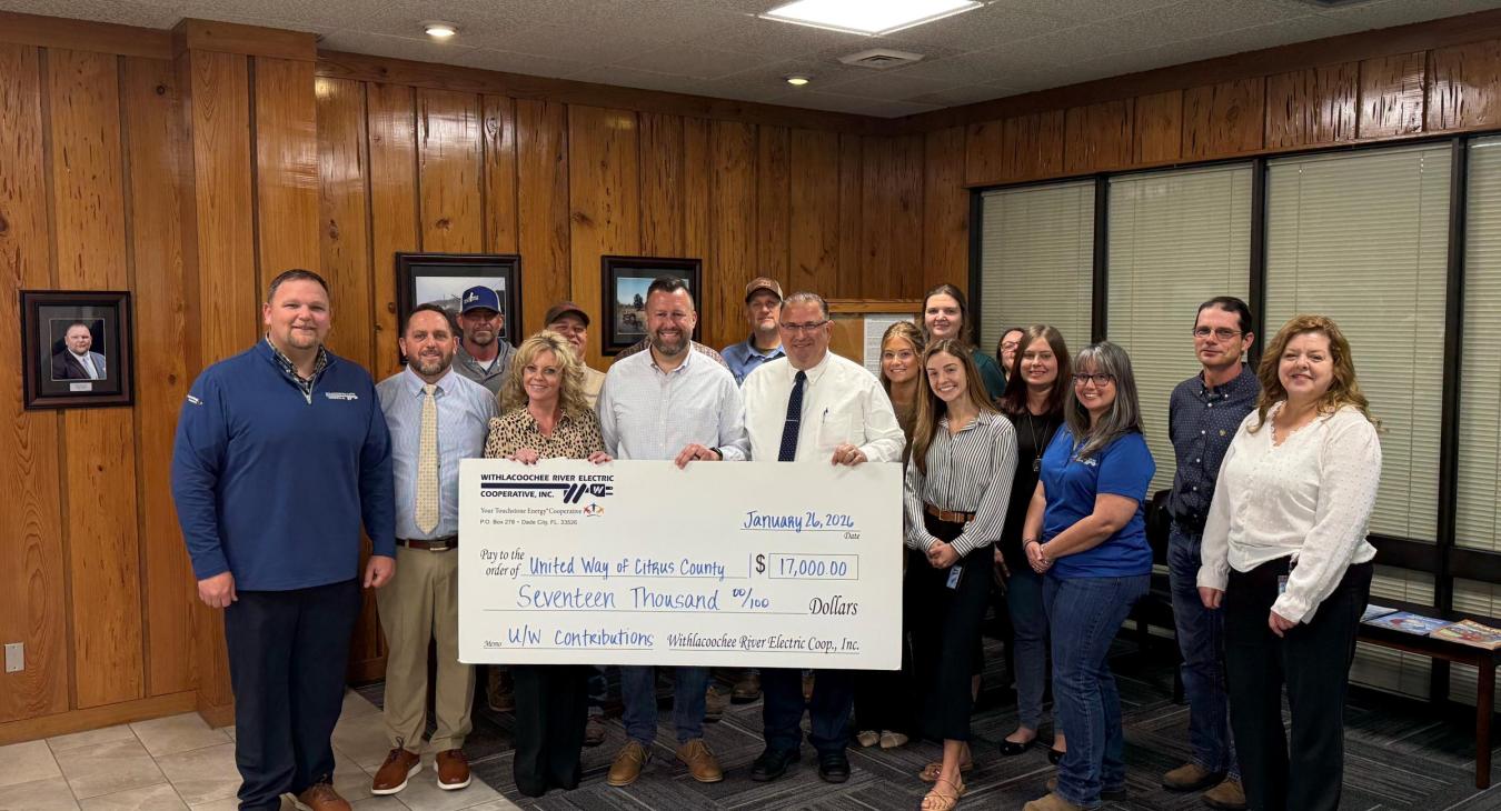 WREC presents United Way of Citrus County with a $17,000.00 donation check